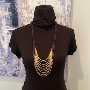 Black & gold long Guess necklace